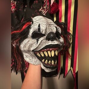 Two Halloween costumes with masks